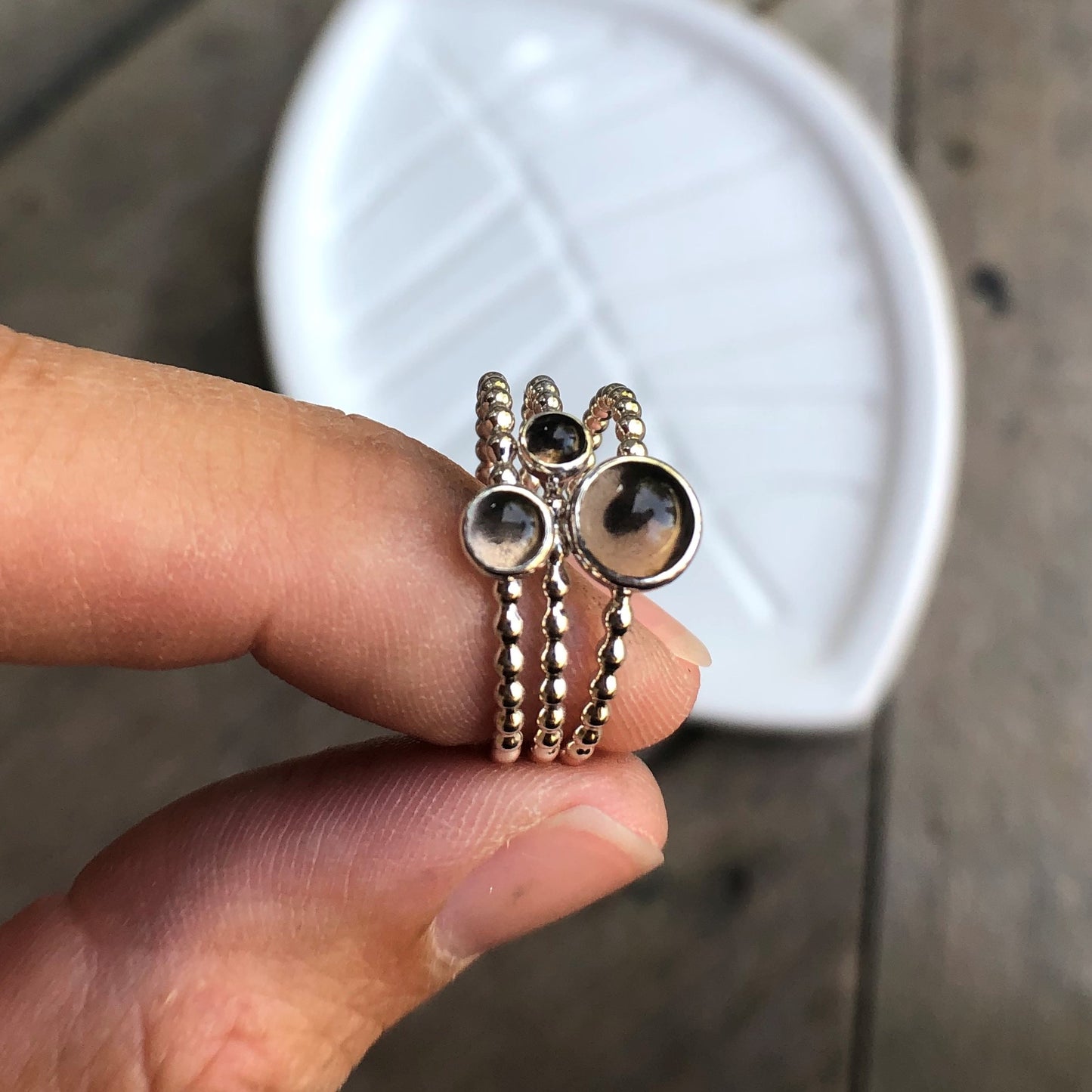 Woman holding different sizes of Smoky Quartz Silver Rings - Trisha Flanagan