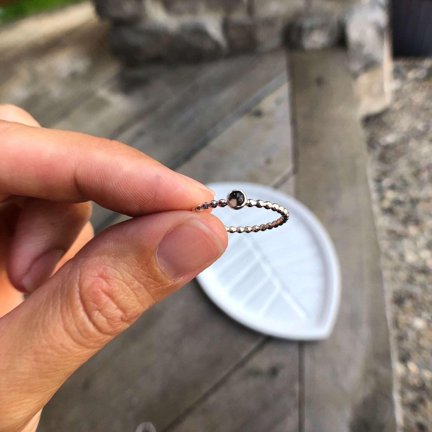 Woman holding a Mini Smoky Quartz Silver Ring - Trisha Flanagan
