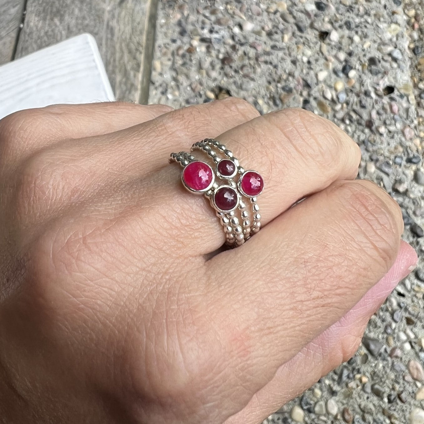 Woman wearing different Ruby Silver Rings - Trisha Flanagan