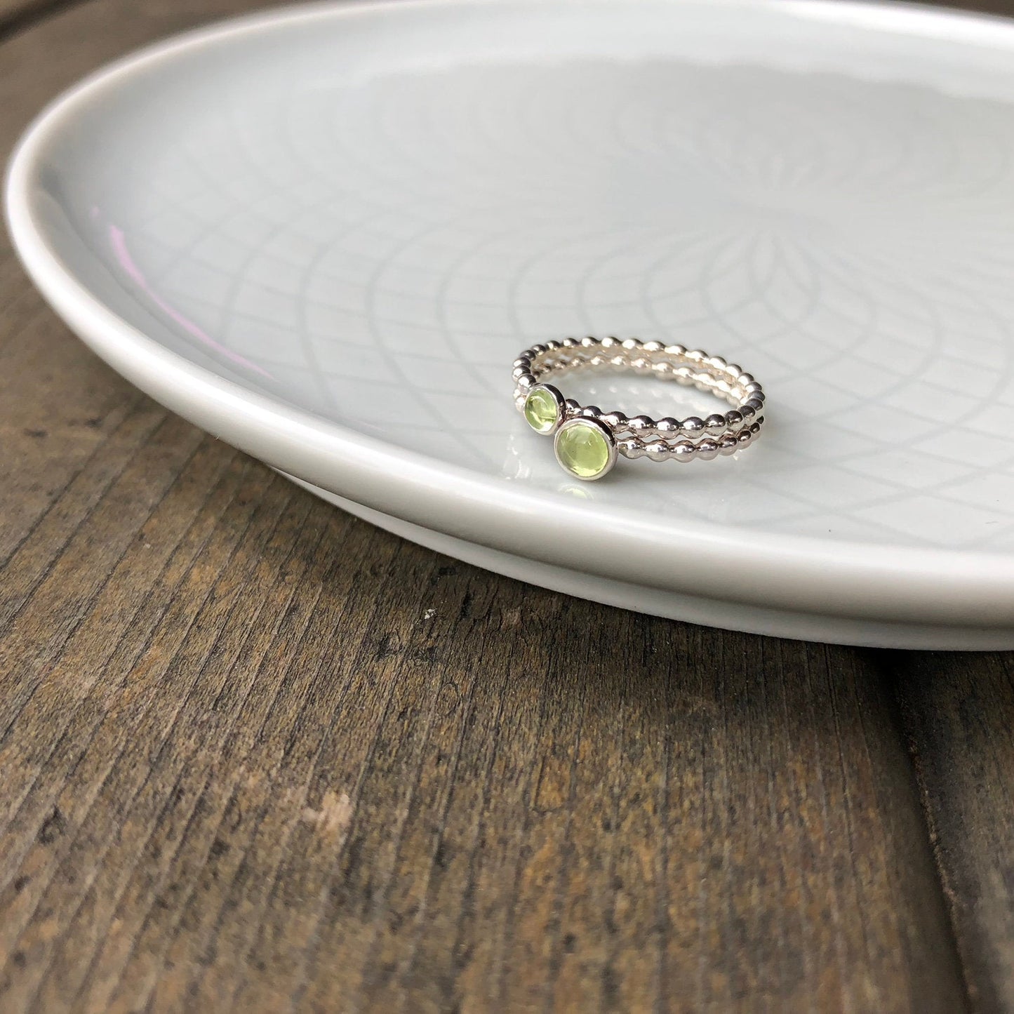 Different size Peridot Silver Stacking Rings stacked - Trisha Flanagan