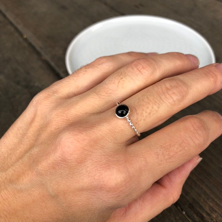Woman wearing Large Black Onyx Sterling Silver Stacking Ring - Trisha Flanagan