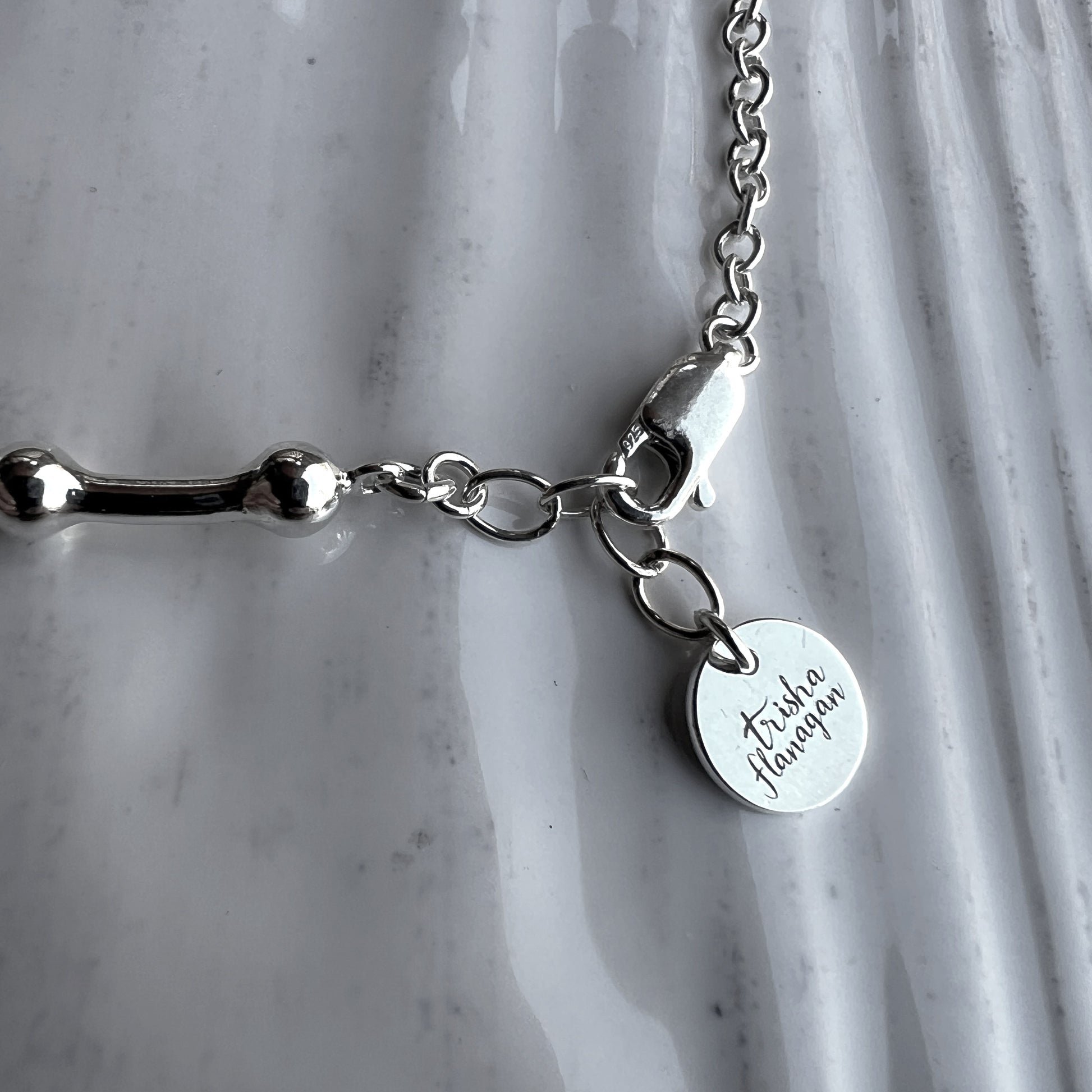 Half inch extender chain with logo charm