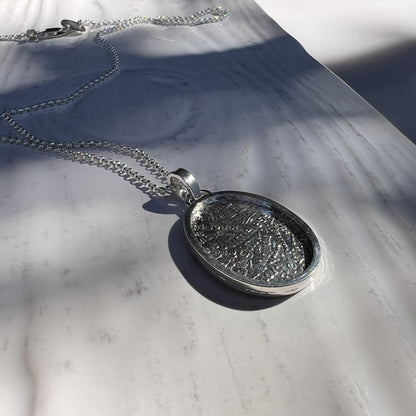 The Wordsmith Pendant side view