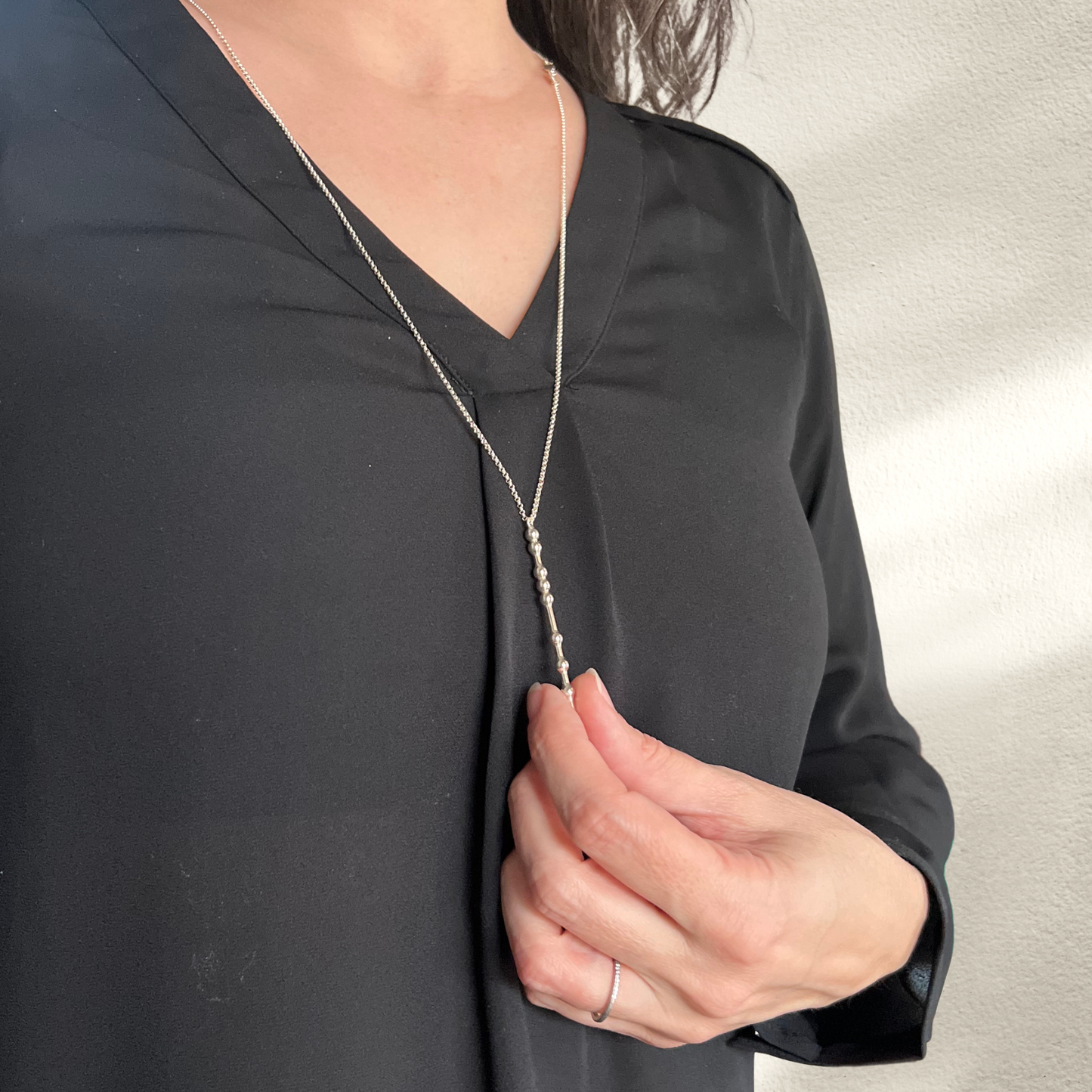 Wearing the vertical Morse Code Pendant