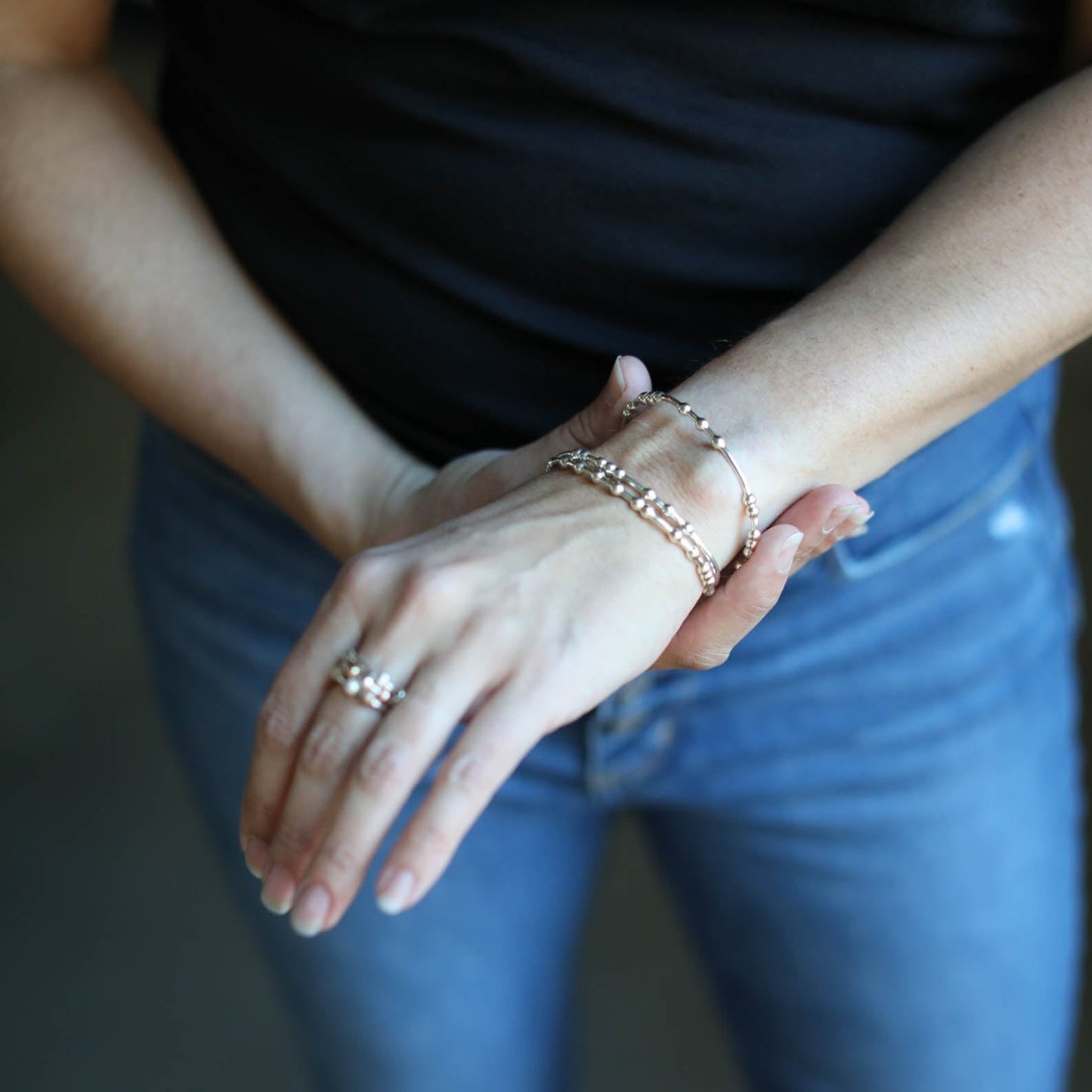 Woman wearing Morse Code Bracelets
