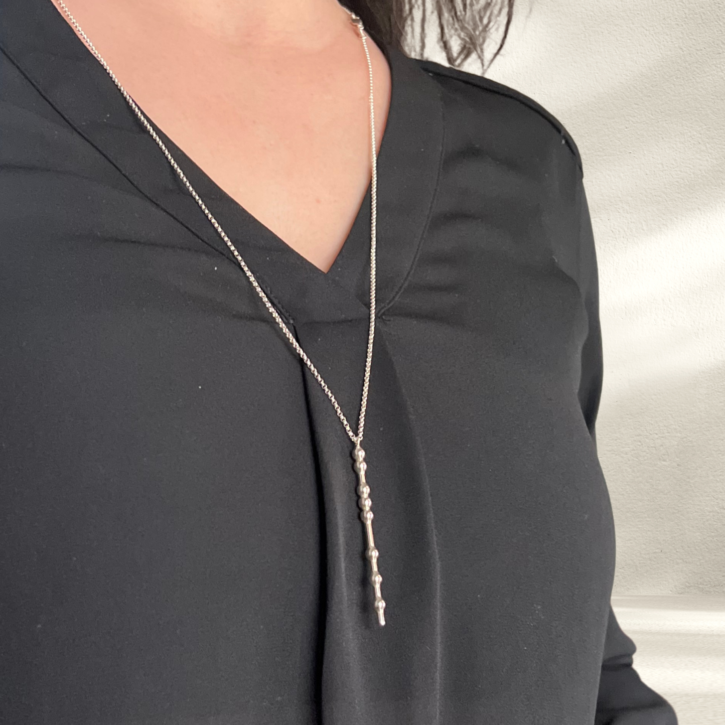 Wearing the vertical Morse Code Pendant