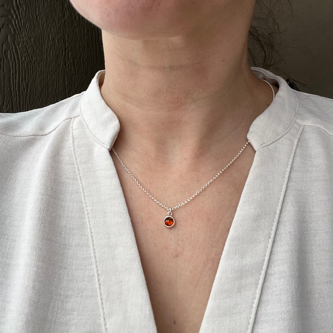 Women wearing the Amber Pendant