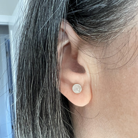 Woman wearing Rose Quartz Stud Earrings in shade