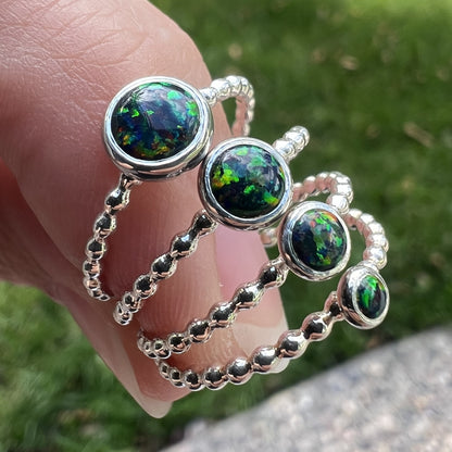 Holding various stone size Black Opal Rings