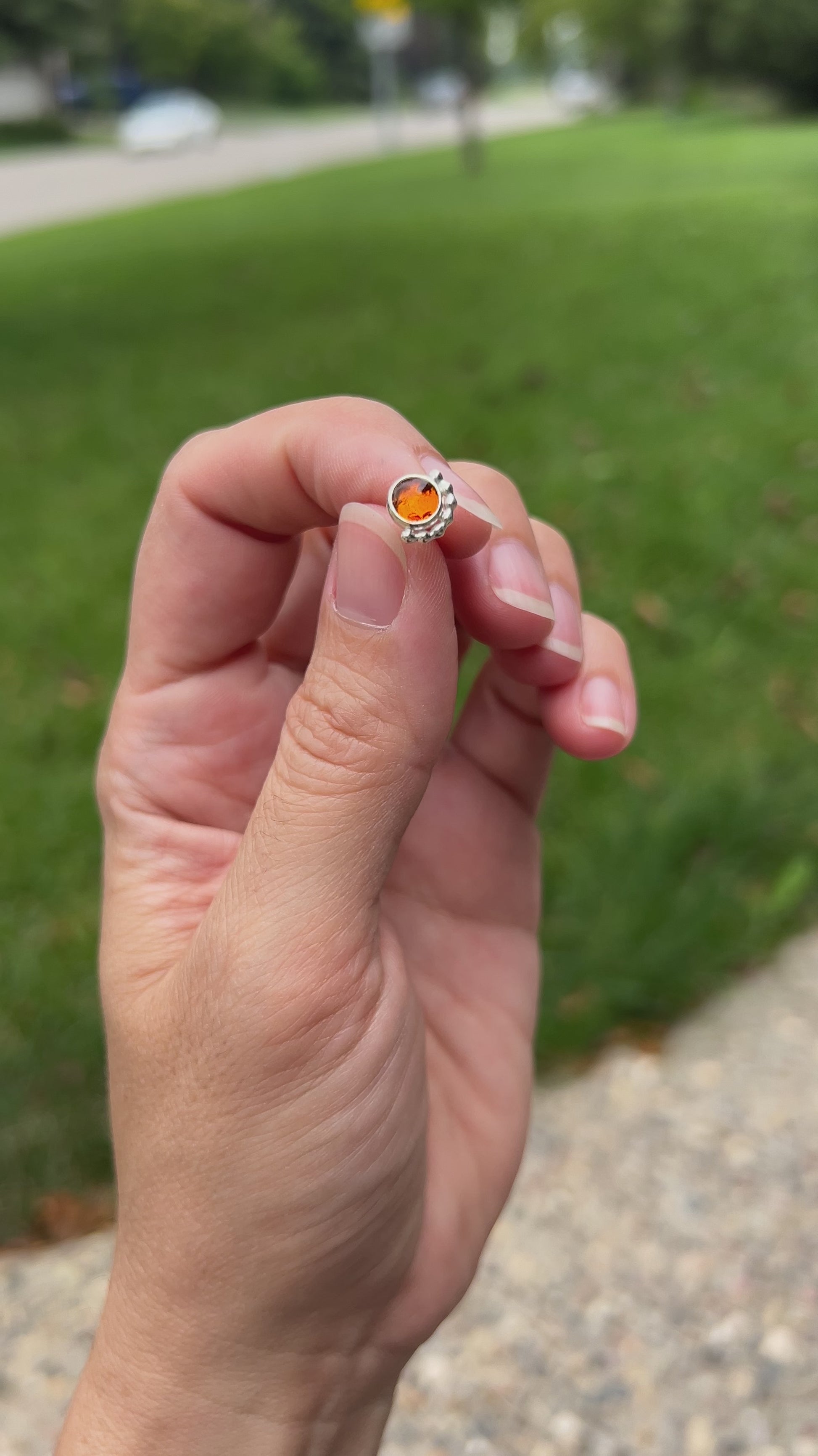 Holding Baltic Amber Statement Earrings