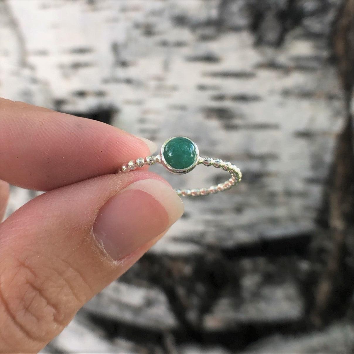Woman holding Medium Emerald Ring - Trisha Flanagan
