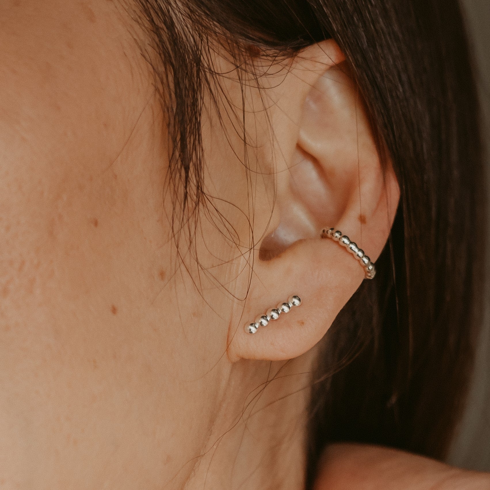 Woman wearing Silver Dot Line Stud Earrings - Trisha Flanagan