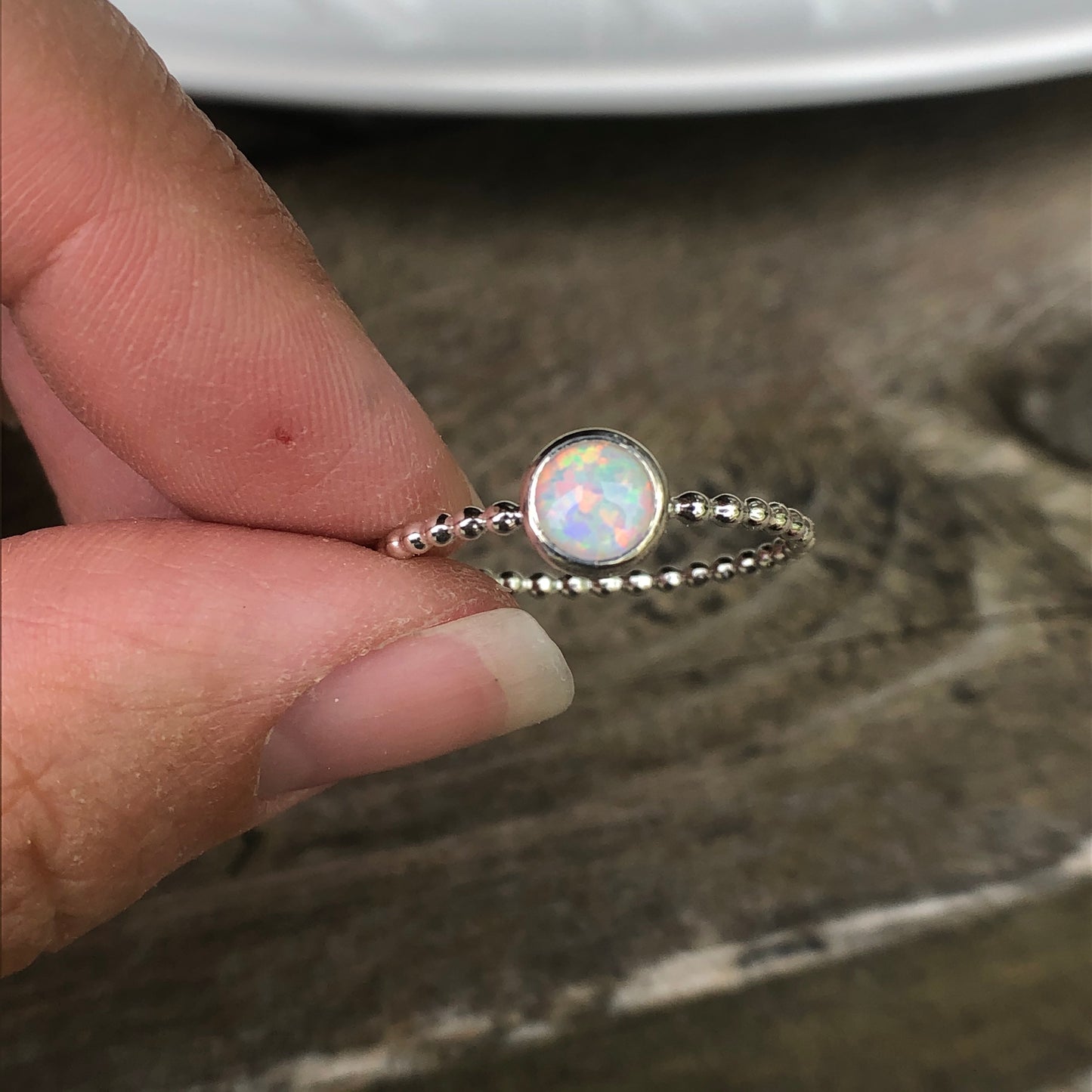 Women holding a Large Manmade Simulated Opal Birthstone Silver Ring - Trisha Flanagan
