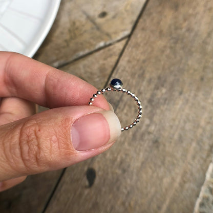 Woman holding a Small Sapphire Silver Stacking Ring - Trisha Flanagan