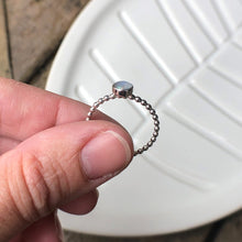Load image into Gallery viewer, Woman holding the LAST ONE of a Medium Manmade Simulated Opal Silver Ring side view - Trisha Flanagan