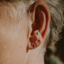 Load image into Gallery viewer, Woman wearing a Micro Textured Circle Studs Earring and a Teardrop Earring - Trisha Flanagan