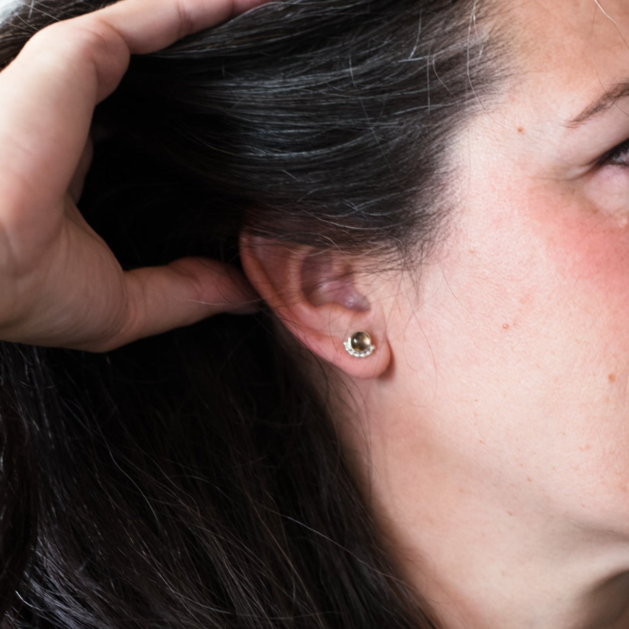Woman wearing a Large gemstone Eyelash stud earring - Trisha Flanagan