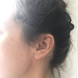 Woman wearing Mini Open Circle Earrings - Trisha Flanagan