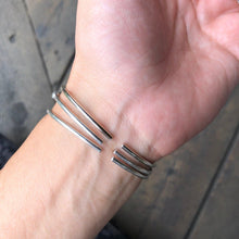 Load image into Gallery viewer, The back of the Morse Code Bracelet while wearing