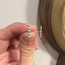 Load image into Gallery viewer, Woman holding Silver Dot Line Stud Earrings - Trisha Flanagan