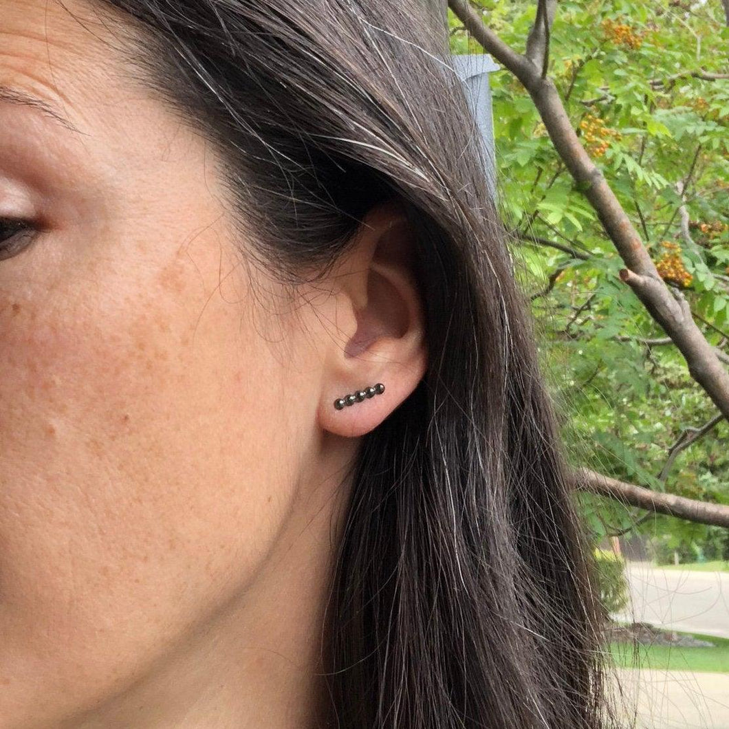 Woman wearing Black Silver Dot Line Earrings - Trisha Flanagan
