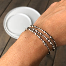 Load image into Gallery viewer, close up of woman wearing 3 morse code bracelets