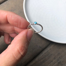 Load image into Gallery viewer, Woman holding a Mini Turquoise Sterling Silver Ring - Trisha Flanagan