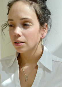 Black OxidizedWoman wearing Silver Fish Bone Pendant and earrings- Trisha Flanagan