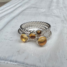 Load image into Gallery viewer, Different size Citrine Silver Rings stacked - Trisha Flanagan